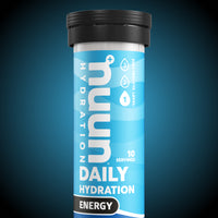 Tube of Nuun Energy on a blue and black background.