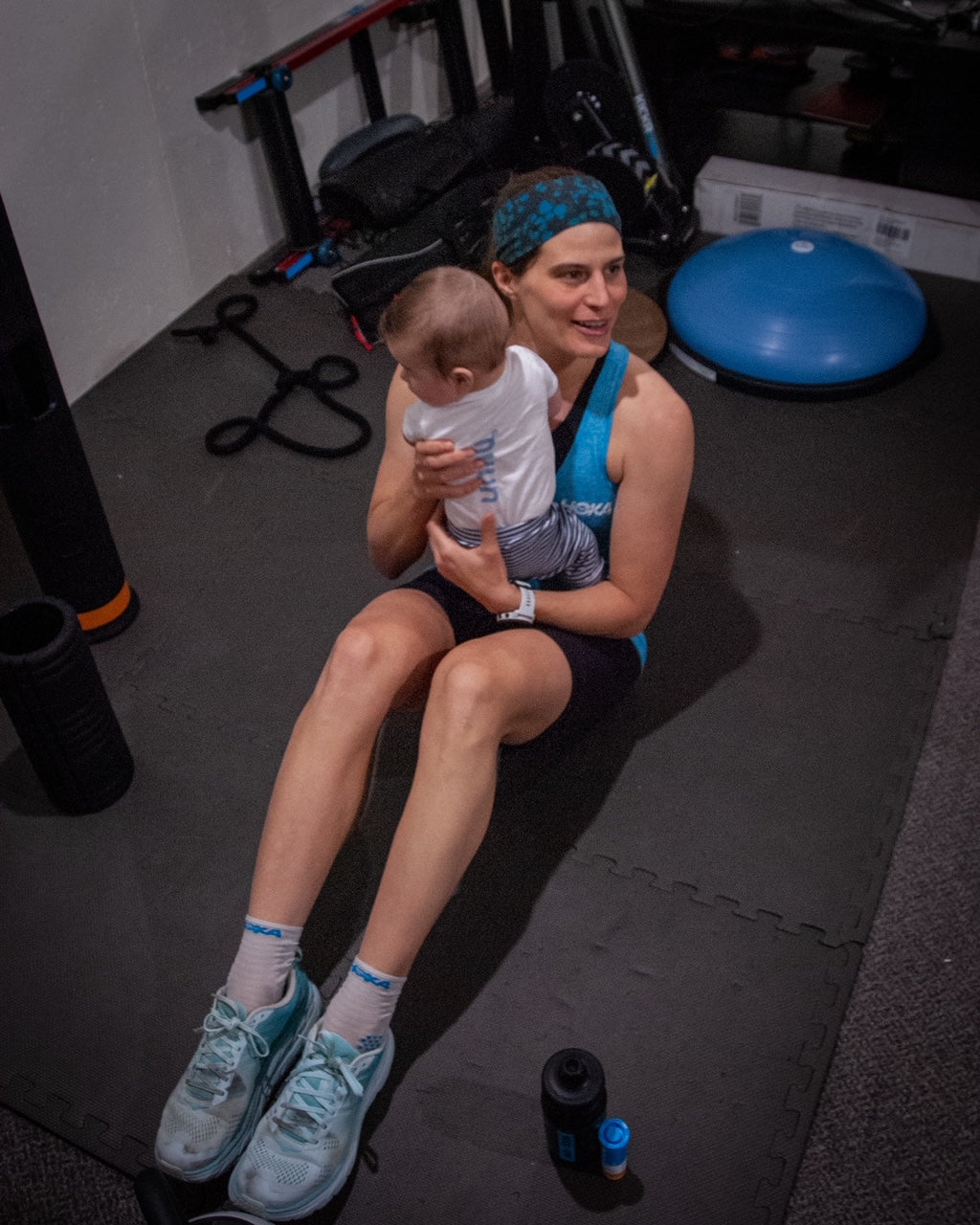 New mom exercising with baby